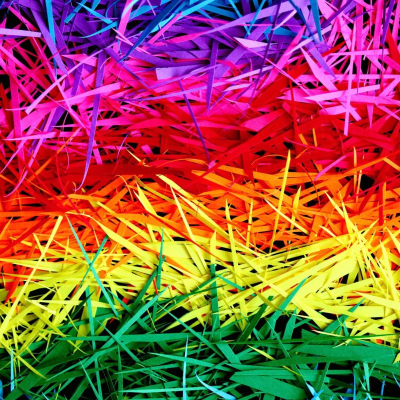 Colorful grass in rainbow spectrum for vibrant visual appeal.